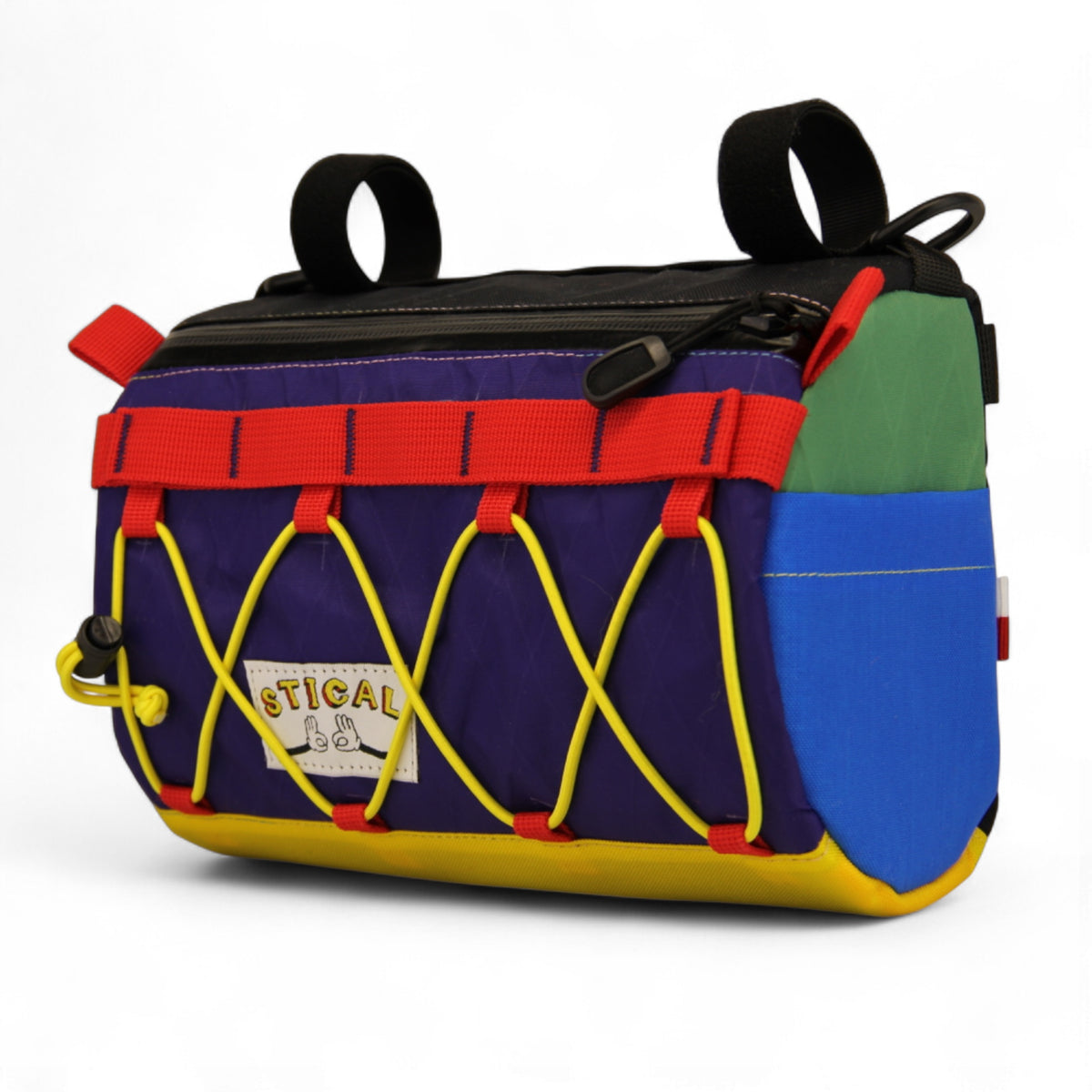 Torba na kierownicę STICAL - widok ze skosa, X-Pac, front fioletowy, bok niebiesko zielony, Cordura